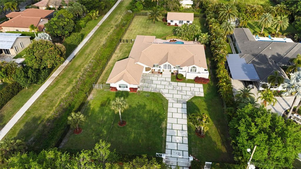 Photo of 7272 NW 65th Terrace, Parkland, FL 33067 (MLS # F10436096)