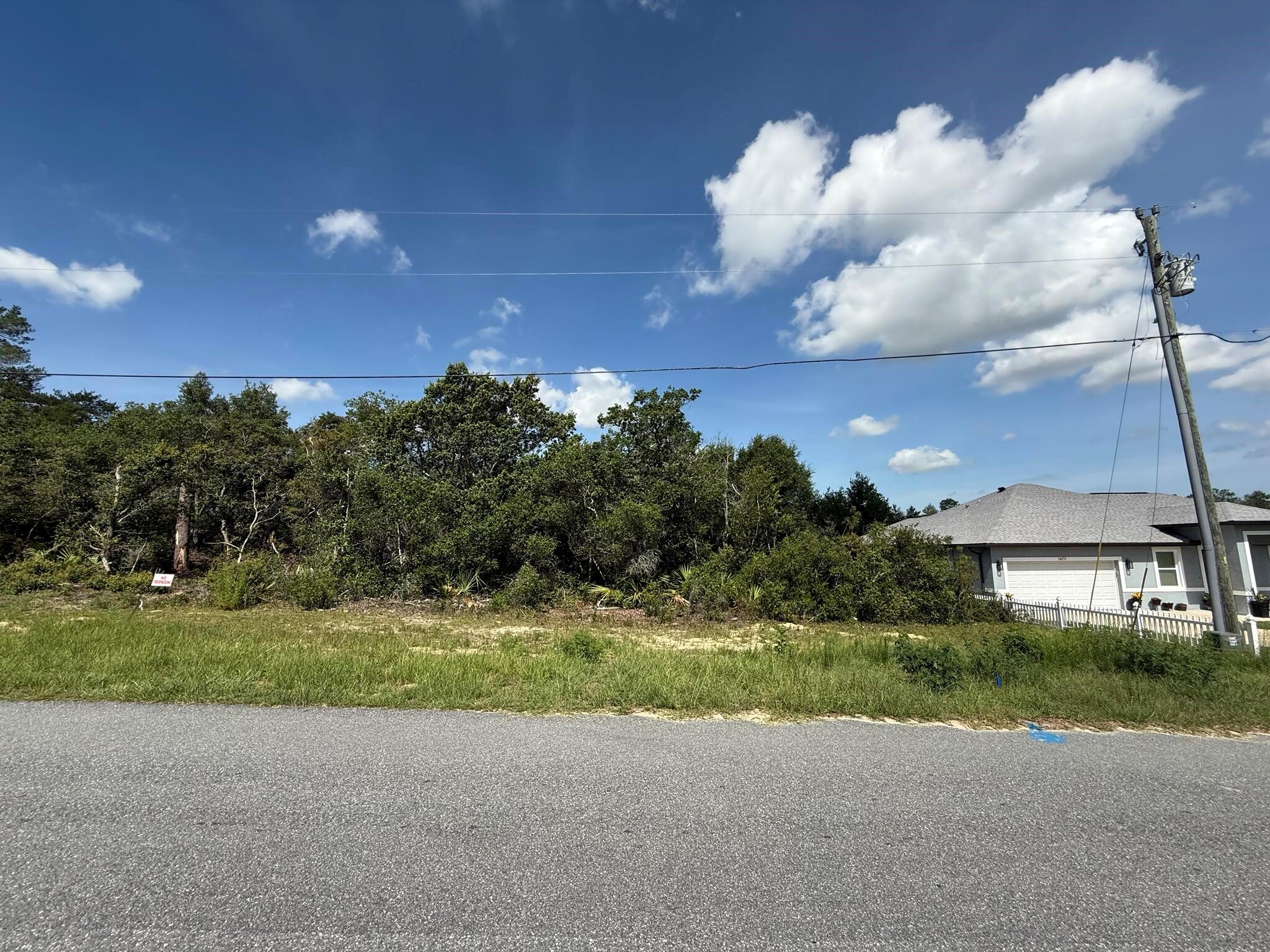 Come check out this beautiful 0.23 acre lot located in the growing community of Marion Oaks. This parcel offers plenty of potential for those looking to build their new home. There are many new builds currently in the process of construction in this area. Convenient to I75, World Equestrian Center, shopping, schools, hospitals, mall, and restaurants! Looking to purchase property in Florida, look no further. Buying Land in Florida is a solid investment for your future. FOR DIRECTIONAL PURPOSES 13272 SW 30th Terr Rd