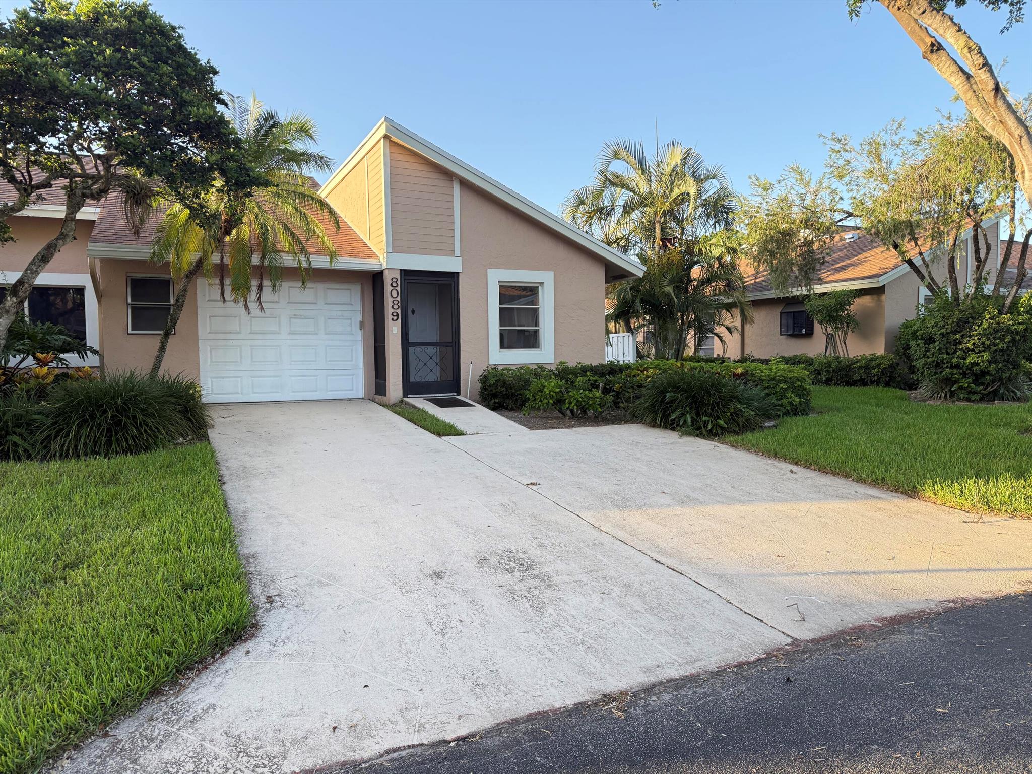 Step into this beautifully updated villa with a **brand-new roof**, nestled in the serene Whisper Walk community of Boca Raton. Recently renovated, this charming home features **volume ceilings**, a **spacious one-car garage**, and **elegant vinyl flooring** throughout. The **modern island kitchen** showcases **quartz countertops**, **stainless steel appliances**, and **contemporary lighting** that adds a stylish touch.Enjoy the comfort of a **Florida room**, a **private patio**, and two generously sized bedrooms, each with **ample closet space**. The home also includes two well-appointed bathrooms, creating a perfect blend of function and comfort.
