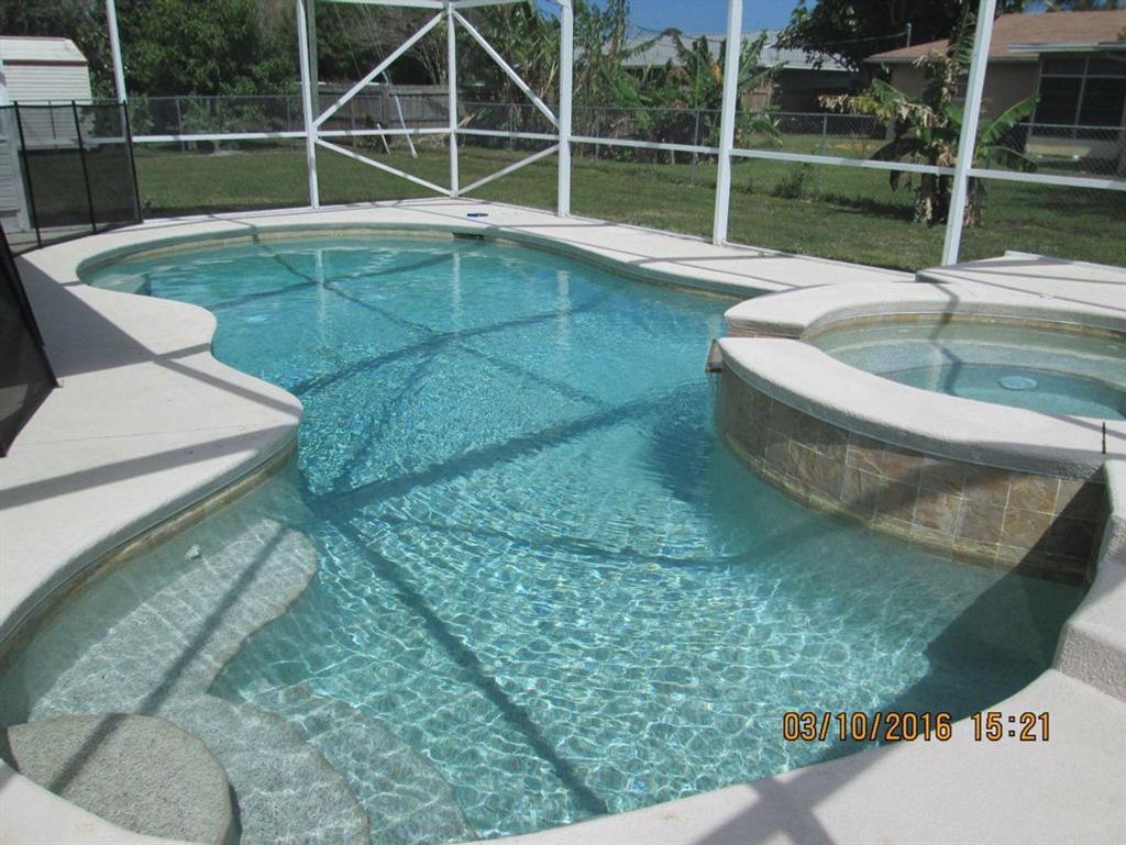 Photo of 107 NW Dorchester Street, Port Saint Lucie, FL 34983 (MLS # R10707575)