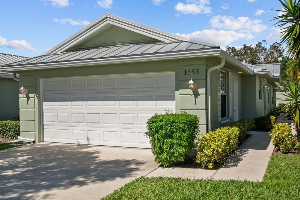Photo of 1663 SW Waterfall Boulevard, Palm City, FL 34990 (MLS # R10976358)