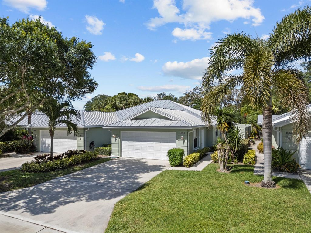 Photo of 1663 SW Waterfall Boulevard, Palm City, FL 34990 (MLS # R10976358)