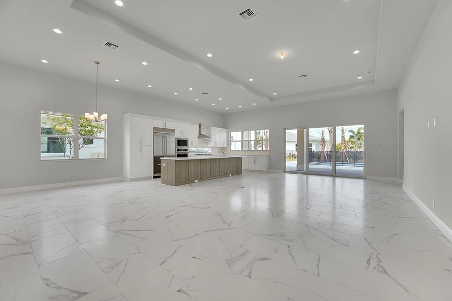 This beautiful 5 bedroom with 3 full and 1 half bath home. The foyer flows into an inviting hallway revealing a bright and open floor plan. The well designed kitchen features a large center island with breakfast bar, plenty of counter and cabinet space and pantry. The expansive primary bedroom suite is highlighted by dual walk-in closets and deluxe primary bath with soaking tub and separate shower and private water closet. Formal dining room and private study. The large great room with expansive sliders opens to a rear covered lanai overlooking a large private lawn. This new construction, 2-story home is waiting for you. You can enjoy the popular contemporary Shirley model has 12 ft ceiling around the first floor Sqft under air 3700.