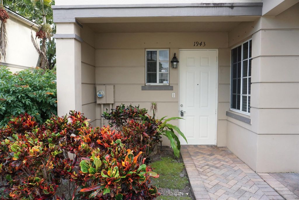 Photo of 1943 Marsh Harbour Drive, Riviera Beach, FL 33404 (MLS # R11133673)