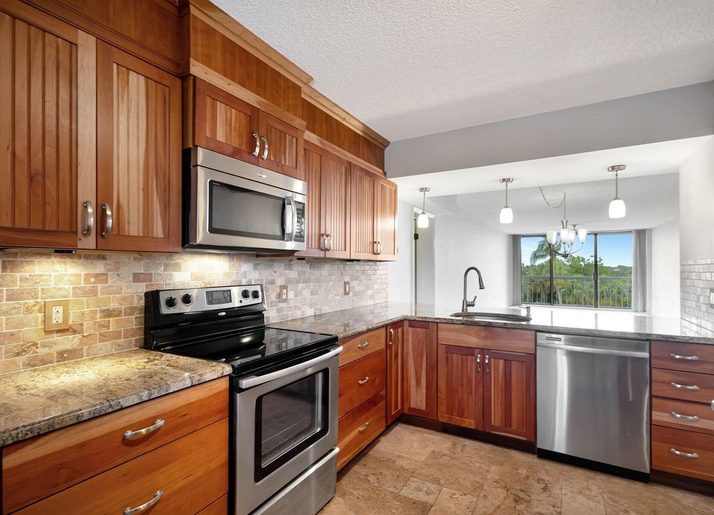 Photo of 2741 Village Boulevard #10-404, West Palm Beach, FL 33409 (MLS # R10981373)