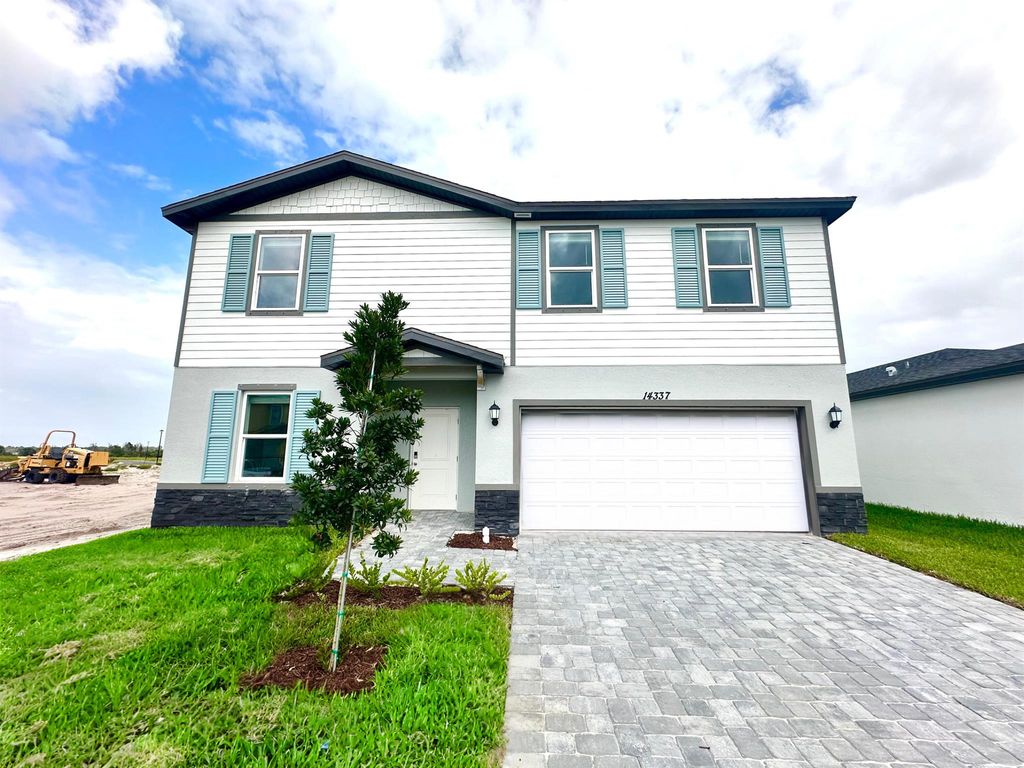 Photo of 14337 SW Rain Road, Indiantown, FL 34956 (MLS # R11117326)