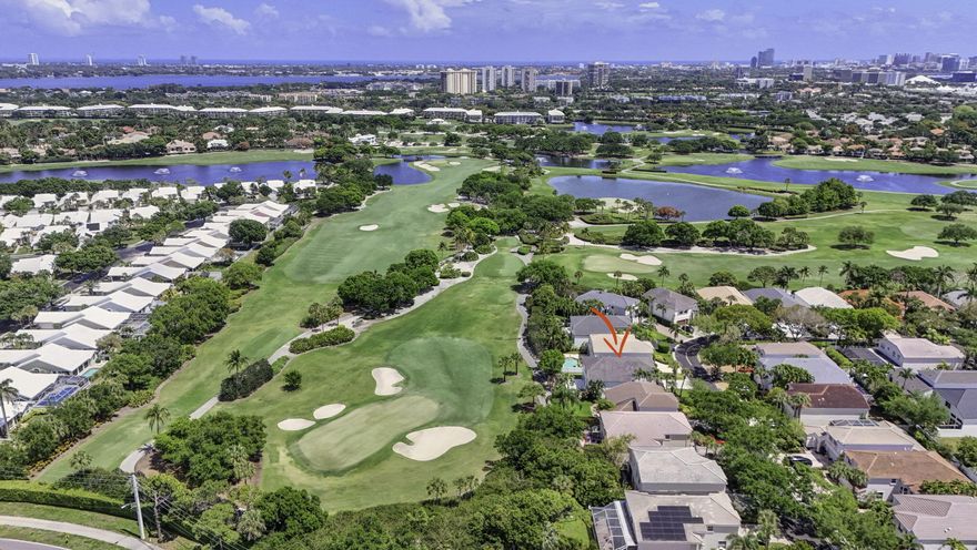 A rare offering of scale, sophistication, and commanding golf course presence within the exclusive enclave of The Classics at Bear Lakes. Perfectly positioned along the 2nd hole of the Lakes Course at Bear Lakes Country Club, this exceptional two-story residence represents the largest and most coveted model in the community, encompassing 5 bedrooms, 3.5 baths, new roof in 2022, and over 3,200 square feet of meticulously curated living space. Upon arrival, you are greeted by a grand open floor plan highlighted by soaring ceilings, Engineered white oak hardwood flooring, and an abundance of natural light. Formal living and dining rooms create a refined setting for entertaining, while the oversized family room—complete with custom built-ins and ambient LED lighting—offers a warm yet  sophisticated gathering space. A beautifully renovated powder room adds a touch of modern luxury to the main level.  The gourmet kitchen is a true showpiece, masterfully reimagined with exquisite attention to detail. Custom cabinetry with crown molding and under-cabinet illumination is paired with striking quartz surfaces and a decorative marble backsplash. A suite of premium appliances—including an oversized Samsung refrigerator and built-in wine refrigeration—complements the substantial quartz island, creating a space as functional as it is visually stunning.  The first level also hosts a privately situated guest suite with Plantation shutters and full bath, offering comfort and discretion, along with a fully redesigned laundry room complete with custom cabinetry, designer utility sink, and high-performance front load GE washer and dryer. Ascending to the second level, a thoughtfully designed split-bedroom layout reveals a primary retreat of remarkable scale and privacy, occupying its own exclusive wing. Bathed in natural light, this serene sanctuary features a spacious sitting area, dual walk-in closets, and a spa-inspired bath complete with custom tilework, dual vanities, a soaking jacuzzi tub, and a sleek frameless glass shower. Three additional guest bedrooms — each generously proportioned and appointed with crown molding and designer fixtures — are complemented by a well-appointed guest bath with dual sinks and combo tub/shower. Step outside to your oversized backyard where sweeping golf course vistas provide a breathtaking backdrop. Low-maintenance turf, a newly installed vinyl fence, and an abundance of open space create the ideal environment for grand-scale entertaining or tranquil relaxation.  Enhancing the home's overall appeal is a comprehensive list of upgrades, including dual newer A/C systems (2020 and 2023), central vacuum, first-floor hurricane impact windows and doors, and second-floor accordion shutters—delivering both comfort and peace of mind.  An extraordinary opportunity to live in one of Palm Beaches most prestigious golf course communities without having to pay a mandatory membership! The Classics at Bear Lakes is a gated community adjacent to the highly sought-after Bear Lakes Country Club and just minutes away from main highways, restaurants & shops, Florida's best beaches, PBI Airport, downtown nightlife, the Outlet Mall, FITTEAM Ballpark of the Palm Beaches, Kravis Center for the Performing Arts and more!