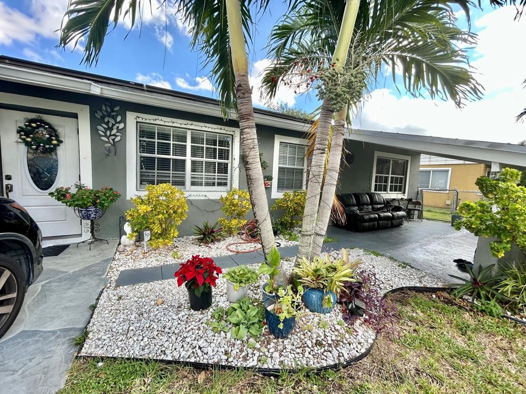 Photo of 1530 SW 68th Ave, North Lauderdale, FL 33068 (MLS # F10538655)