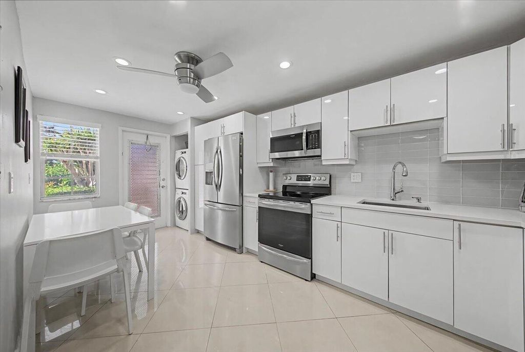 Photo of 2701 S Palm Aire Drive #103, Pompano Beach, FL 33069 (MLS # B26002307)