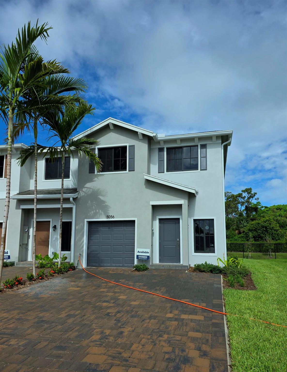 Beautiful Architectural 40 Multi-Level Townhomes in the heart of Palm Beach. This community has three open-concept layouts with five different finishes with Stainless Steel Whirlpool Appliances; 36'' Upper Wood Dark Wood Color Cabinets, Quartz Kitchen Countertops with a square edge and 4'' backsplash. Main Floor comes with 24 X 24 Omega White Porcelain tiles, Mohawk Carpet on stairs and 2nd floor, Cultured Marble White Countertops, laundry room on 1st floor, two walk-in closets, and tankless water heater. Each home is equipped with smart home technology featuring Smart Deako Lighting. Easy access to most major highways and nearby dinning and shopping