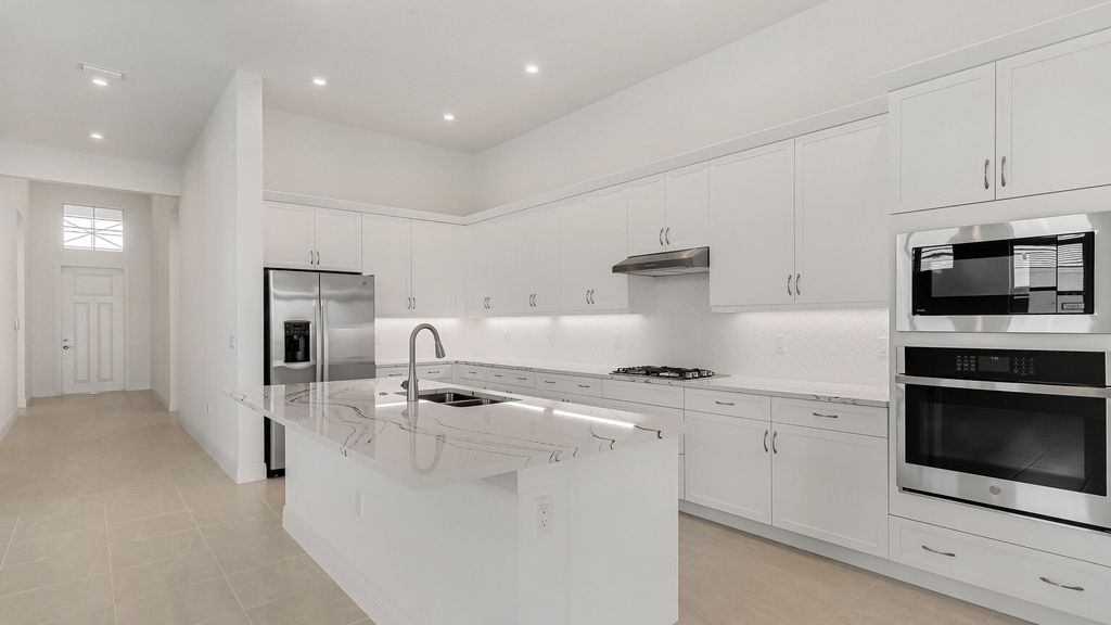 Photo of 2180 SE Mosaic Boulevard, Port Saint Lucie, FL 34984 (MLS # R10966837)