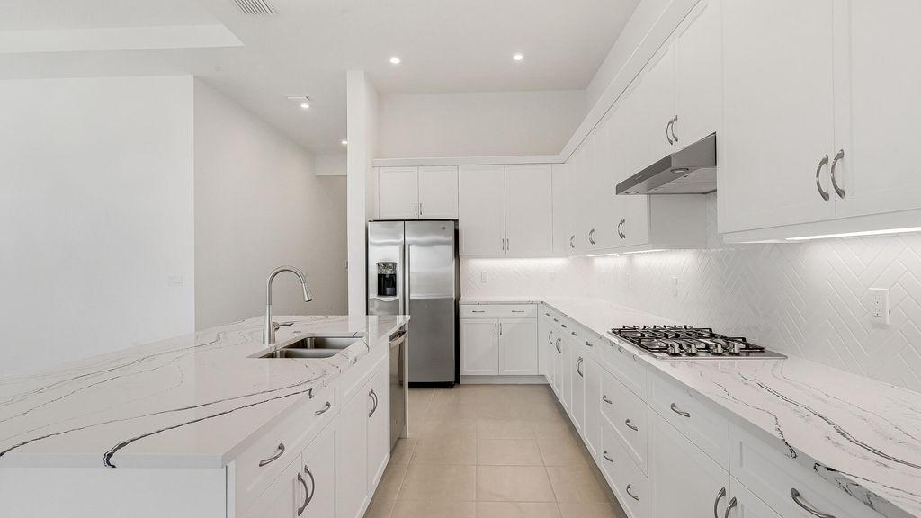 Photo of 2180 SE Mosaic Boulevard, Port Saint Lucie, FL 34984 (MLS # R10966837)