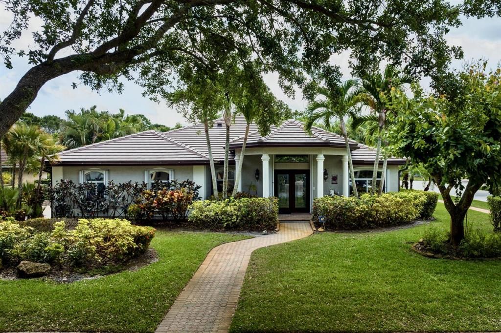 Photo of 4980 SW Hammock Creek Drive, Palm City, FL 34990 (MLS # R10876591)