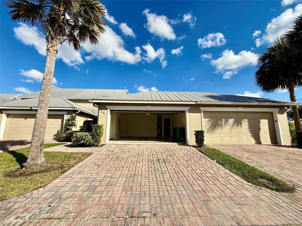 Photo of 10495 SW West Park Avenue, Port Saint Lucie, FL 34987 (MLS # F10537158)