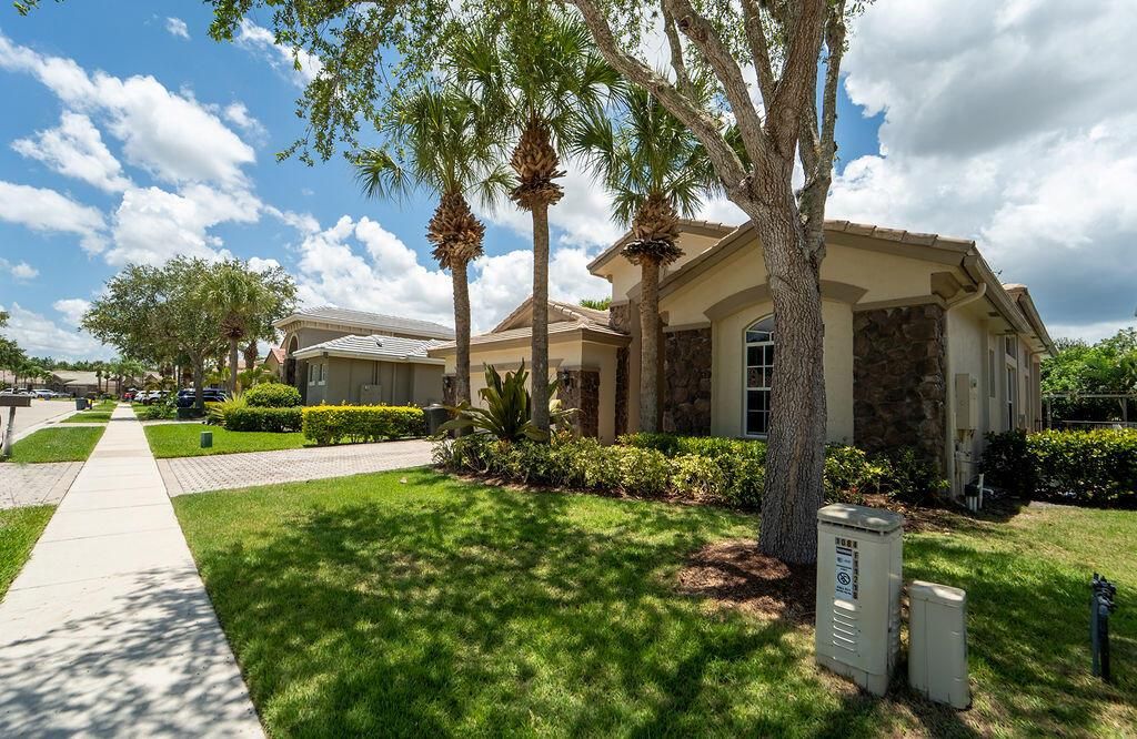 Photo of 11218 Osprey Lake Lane, Palm Beach Gardens, FL 33412 (MLS # R11101127)