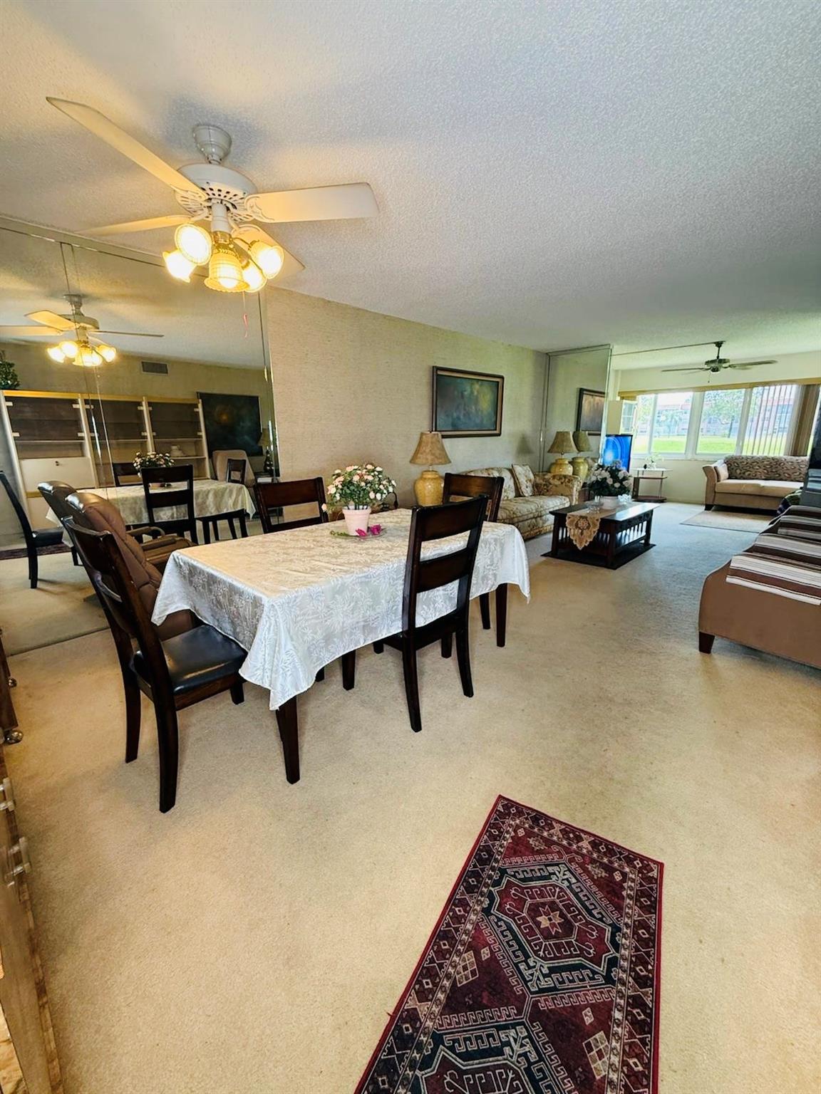 This charming two-bedroom, two-bath condo offers a cozy retreat in a 55+ community. An open layout with natural light and elegant finishes creates a welcoming atmosphere. The kitchen boasts ample cabinetry and well-maintained appliances. The Florida room extends the living space, perfect for relaxing. The Florida and master suite features impact windows, a walk-in shower, and storage. A second bedroom and bath provide flexibility.
A 2020 AC ensures comfort, and impact windows enhance security. The community offers a pool, clubhouse, and easy access to amenities. Ideal as a residence or retreat.