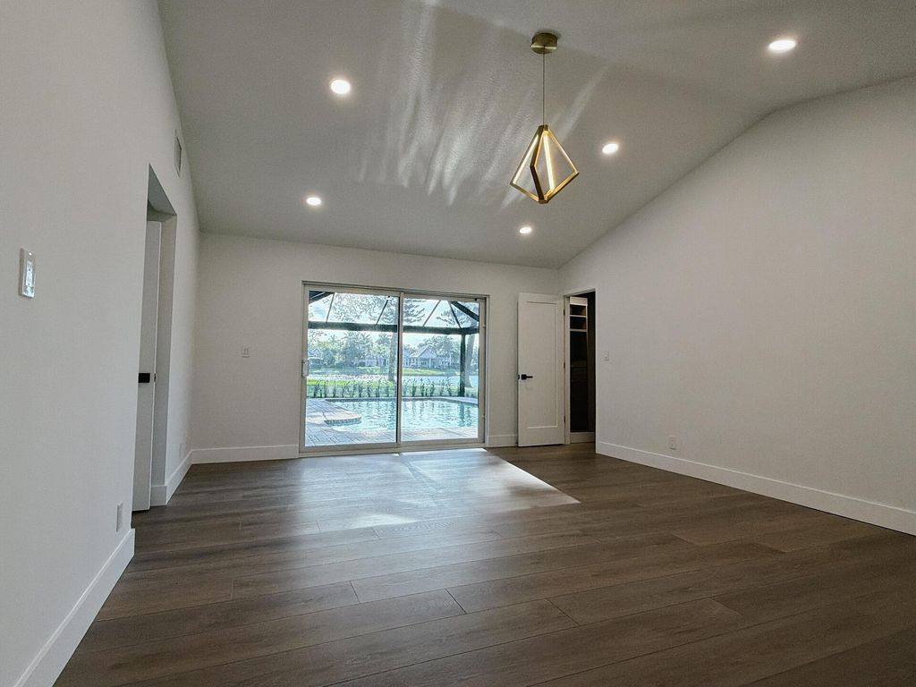 Photo of 7411 Dover Lane, Parkland, FL 33067 (MLS # B26022068)