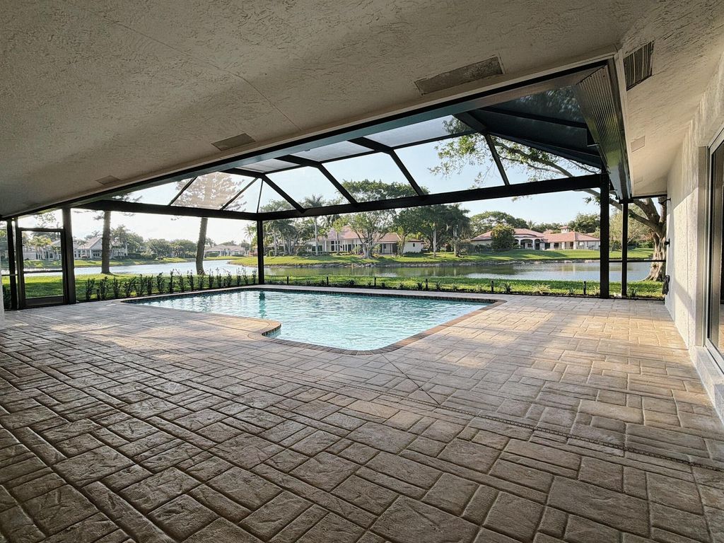 Photo of 7411 Dover Lane, Parkland, FL 33067 (MLS # B26022068)