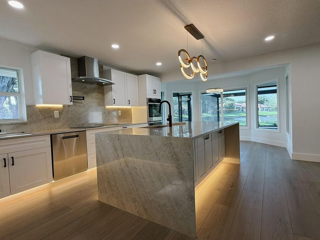 Photo of 7411 Dover Lane, Parkland, FL 33067 (MLS # B26022068)