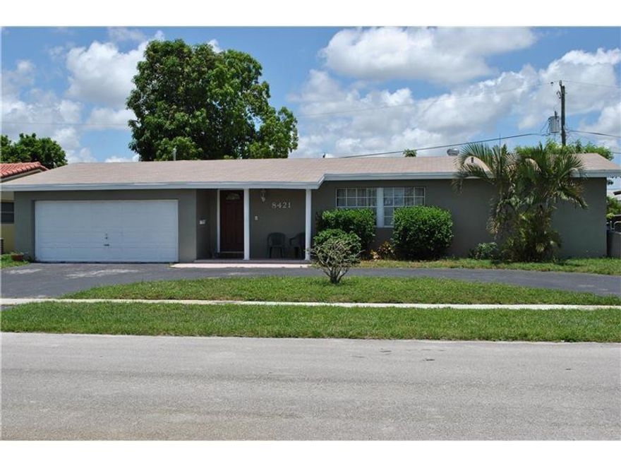 Well Cared for Pool Home in the Desirable Sunrise Golf Village. This Spacious 4 Bdrm, 2 Bath Offers a Split Floorplan w/ Open Kitchen, Formal Living Rm, Family Rm, and Dining Rm Creating an Ideal Space for Entertaining. Kitchen Window looks onto Serene Enclosed Pool Area with Plenty of Room for Outdoor Dining and Enjoyment. Guest Bathroom renovated 2017. Circular Driveway perfect for parking of boat under 30 ft. This is a must see!