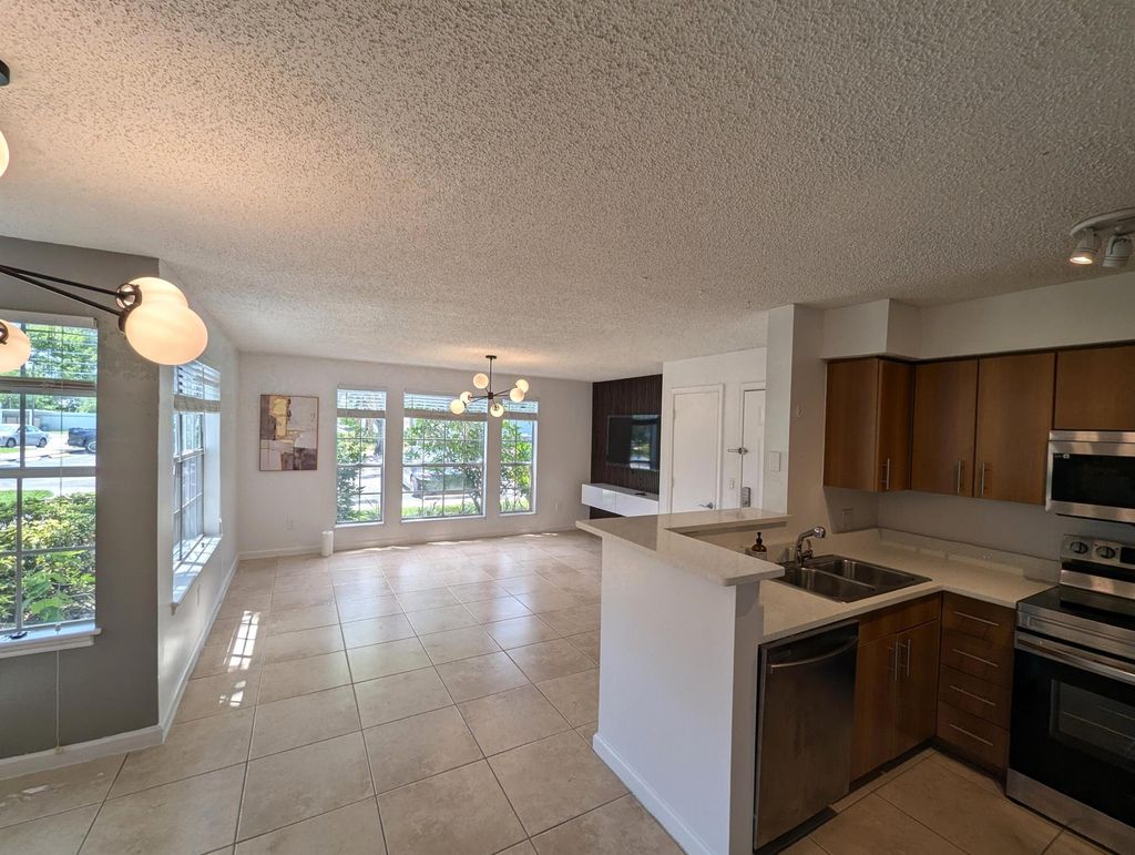 Photo of 1215 Crystal Way #G, Delray Beach, FL 33445 (MLS # R11144856)