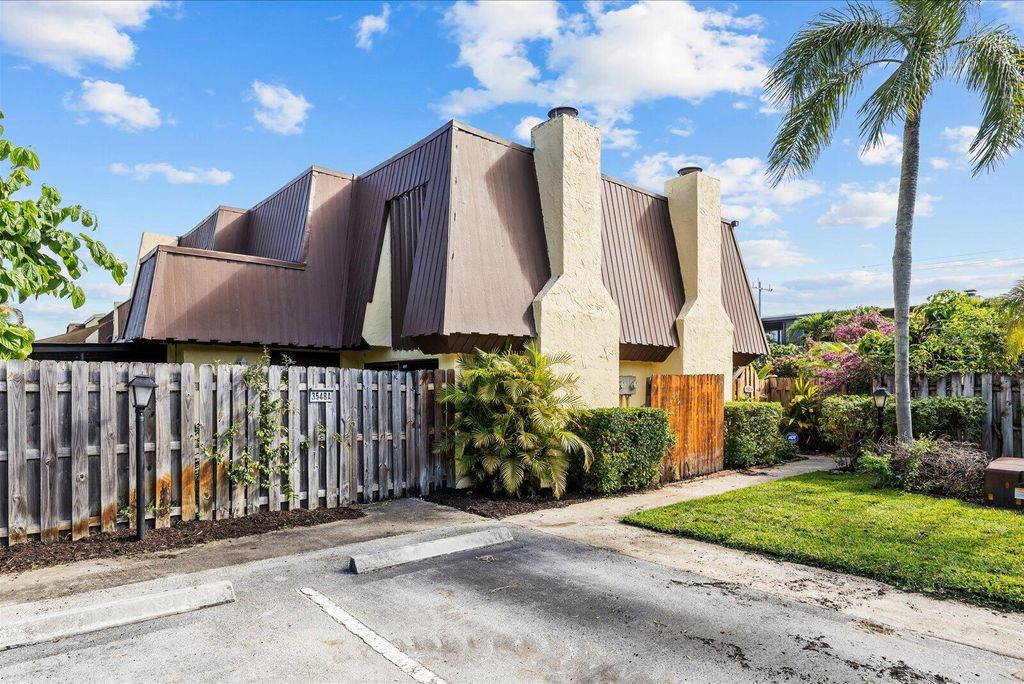 Photo of 3548 Gardens East Drive #B, Palm Beach Gardens, FL 33410 (MLS # B26017884)