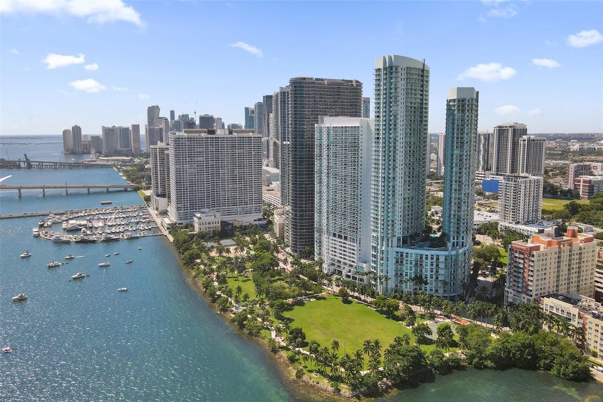 Experience Miami Luxury high-rise living in the highly sought after Edgewater area. Oversized open floor-plan with 13 foot high ceilings & an incredible primary suite. This Unique floor-plan has a den/art studio. Great space for a home office, media room, guest suite. Open-concept layout that maximizes natural light throughout the living spaces. Floor-to-ceiling windows line the living room / dining area & Kitchen, allowing sunlight to pour in from multiple angles during the day. Bay/park views from the balcony. Located directly across the street from Margaret Pace Park. Great Walkable community for spending time outdoors and walking to nearby attractions including bars, restaurants, fitness, & stores. Just north of Bayfront Park & the Kaseya Center.