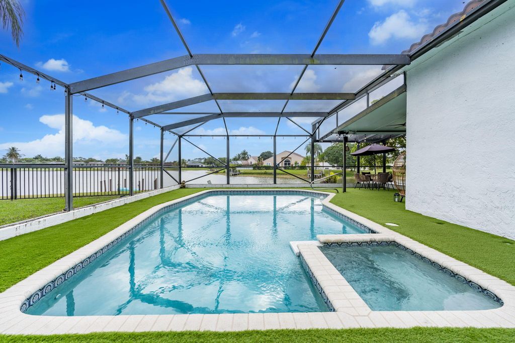 Photo of 8321 Bonita Isle Dr, Lake Worth, FL 33467 (MLS # R11159897)