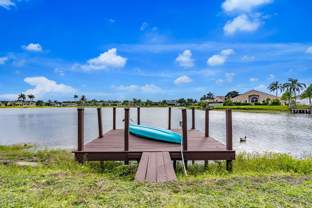 Photo of 8321 Bonita Isle Dr, Lake Worth, FL 33467 (MLS # R11159897)