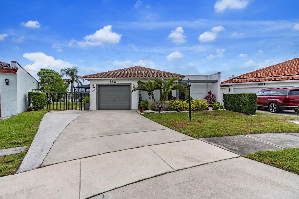 Photo of 8321 Bonita Isle Dr, Lake Worth, FL 33467 (MLS # R11159897)
