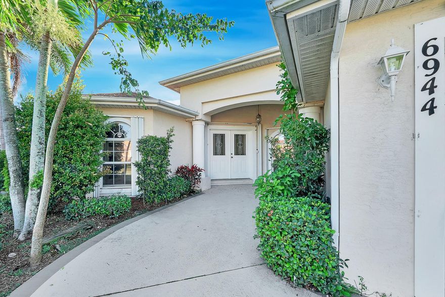 Spacious and well-designed 4-bedroom, 3-bath home with a 3-car garage.  This triple split-bedroom layout offers privacy and flexibility, featuring a formal dining room plus separate living and family rooms ideal for everyday living and entertaining. Enjoy Florida living on the enclosed patio with hot tub that conveys. Main bathroom includes a walk-in tub for added comfort and convenience. No HOA. ****Seller is offering a $22,500 roof credit toward a new roof. A fantastic opportunity to add value and personalize this home to your taste.****