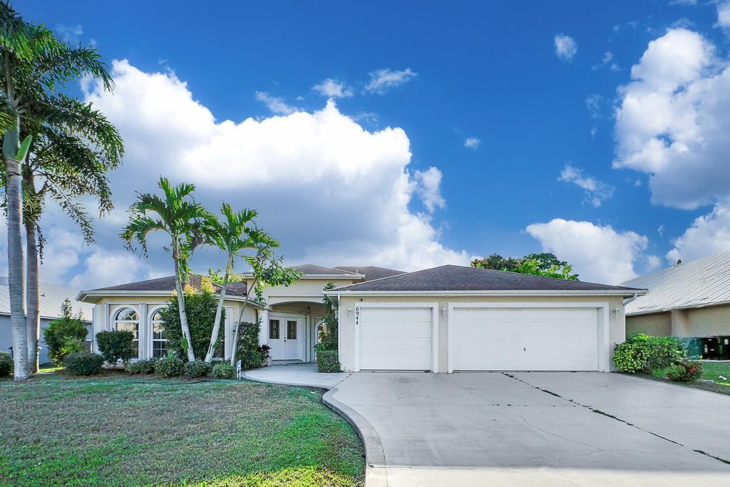 Photo of 6944 NW Daffodil Lane, Port Saint Lucie, FL 34983 (MLS # F10543125)