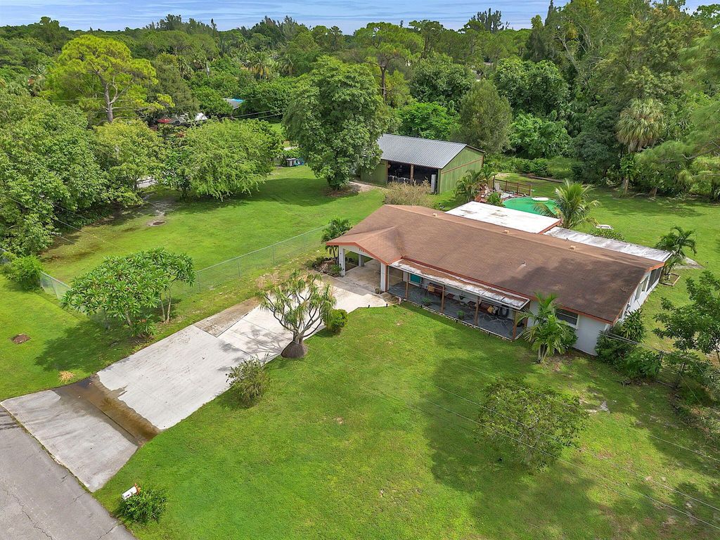 Photo of 770 Fergusson Lane, West Palm Beach, FL 33415 (MLS # R10923132)