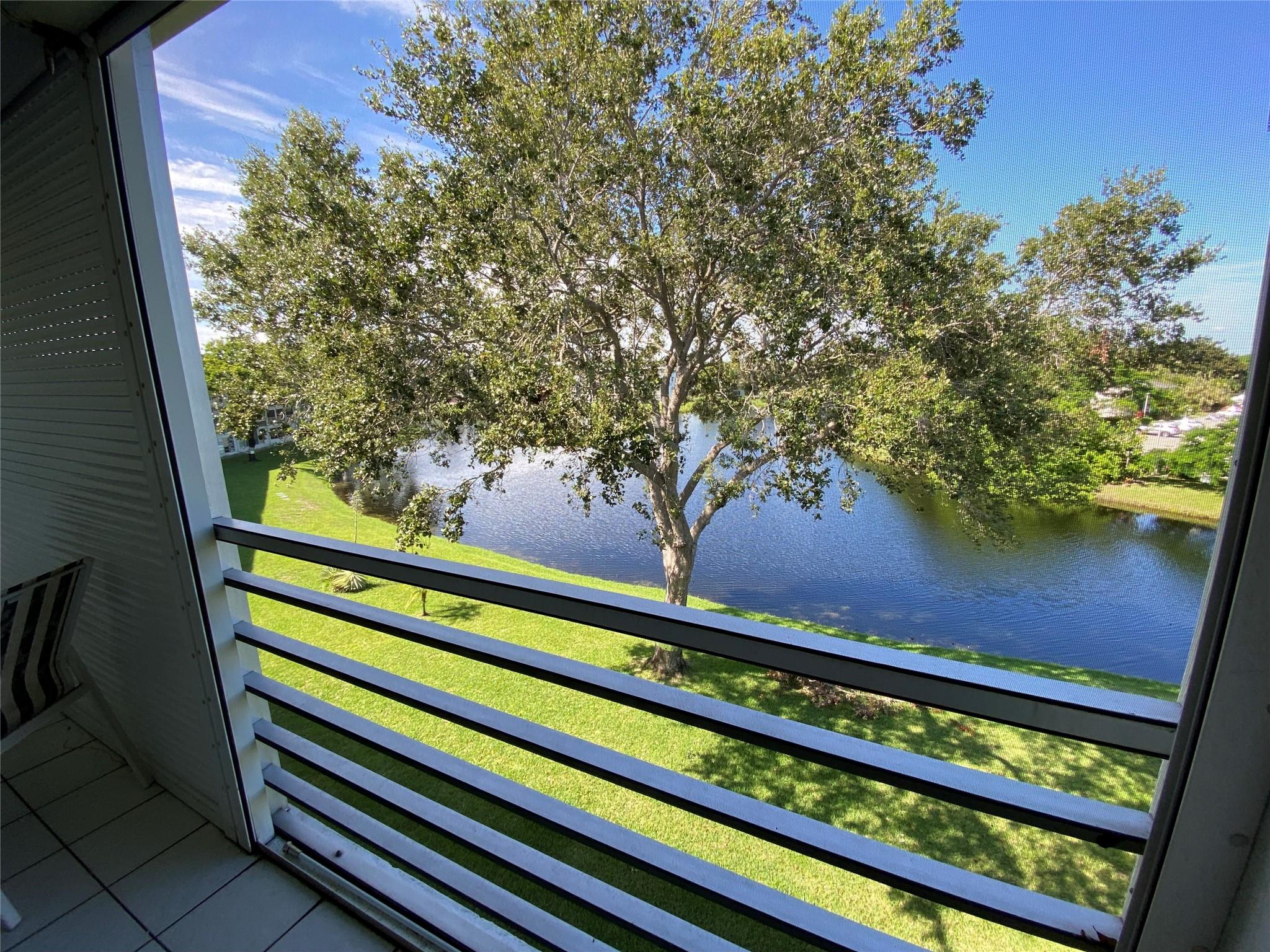 Rarely available! 2 bedroom 2 full bath unit in the very desirable Islewood D building. Unit has impact door, all tile, guest bath has walk in shower. Screened patio has one of the best water views in the village. This building is very well maintained, laundry rooms, have impact doors and windows. Private patio area for owners, and just steps from pool. Clubhouse has live shows, fitness center, music and craft rooms, indoor pool, and new outdoor pool with zero entry. Cafe on property. Shuttle buses to malls, grocery stores, and much more. This is resort style living at a reasonable price. All offer must be accompanied by proof of funds. Seacrest managed building monthly HOA CenClub $110,CVEMM $172 Seacrest $349.15..total $631.15...NON RENTAL BUILDING.