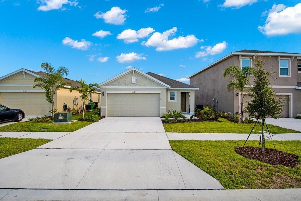 Photo of 12341 SW Nettuno Way, Port St Lucie, FL 34987 (MLS # R10992390)