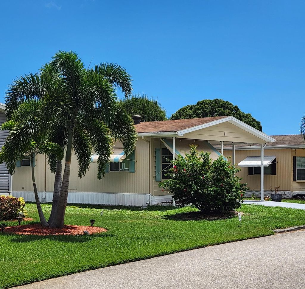Photo of 21 Camino Del Rio, Port Saint Lucie, FL 34952 (MLS # R11102926)