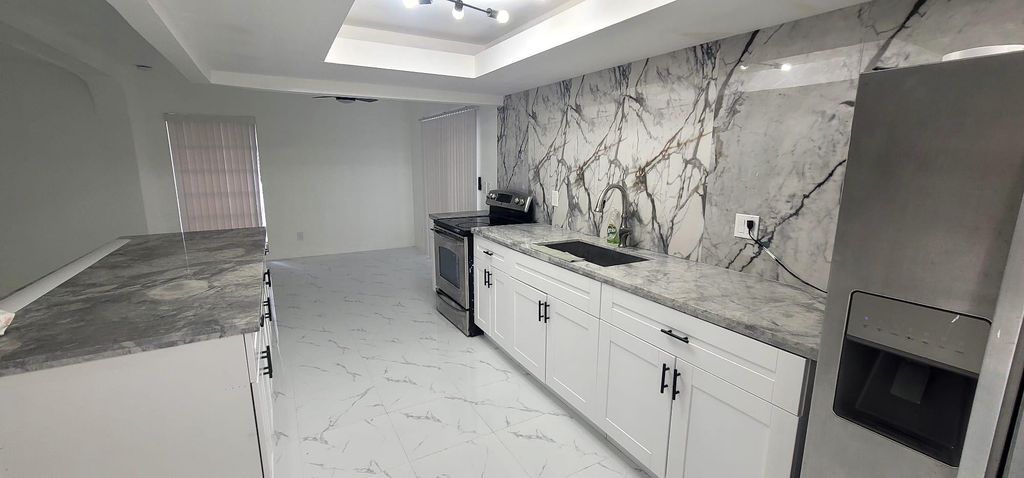 Photo of 7109 NW 68th Street, Tamarac, FL 33321 (MLS # F10556650)