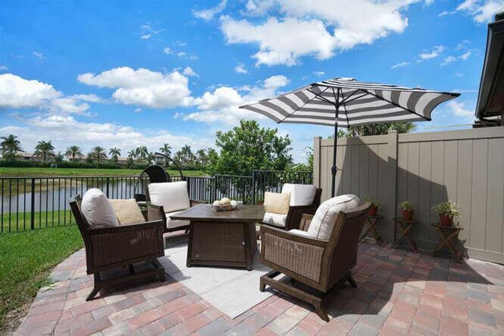 Photo of 8344 Cadre Noir Road Rd, Lake Worth Beach, FL 33467 (MLS # R10713496)