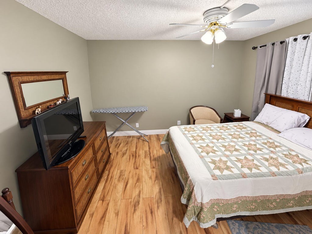 Photo of 3810 VIA POINCIANA #303, Greenacres, FL 33467 (MLS # B26077832)