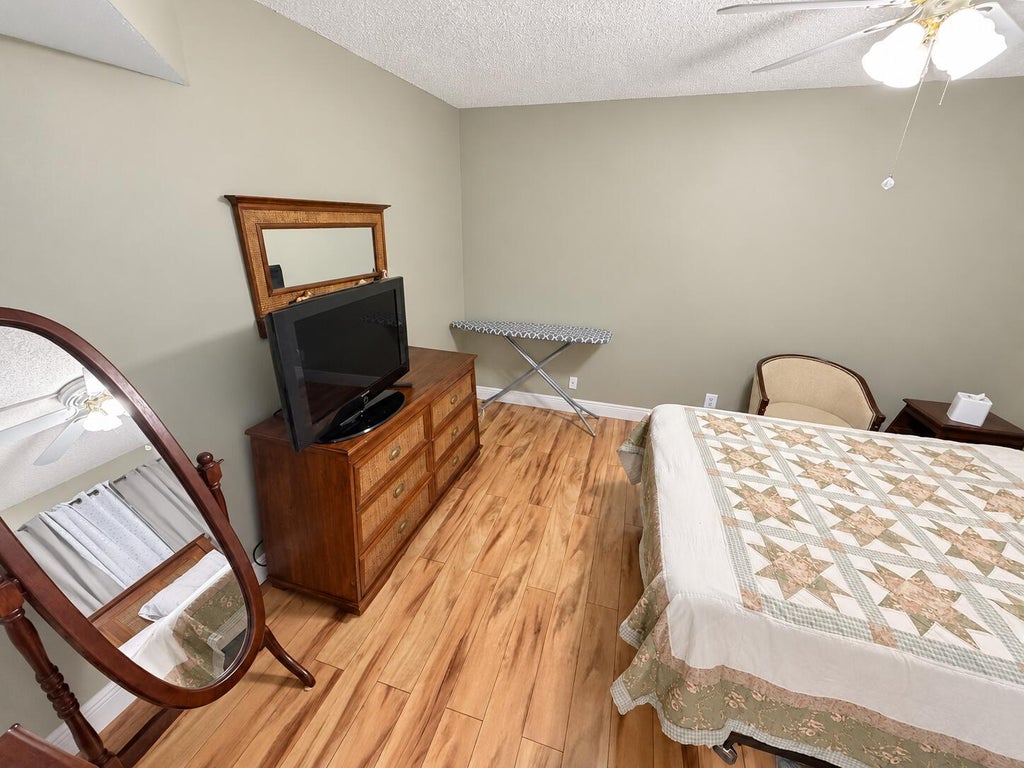 Photo of 3810 VIA POINCIANA #303, Greenacres, FL 33467 (MLS # B26077832)