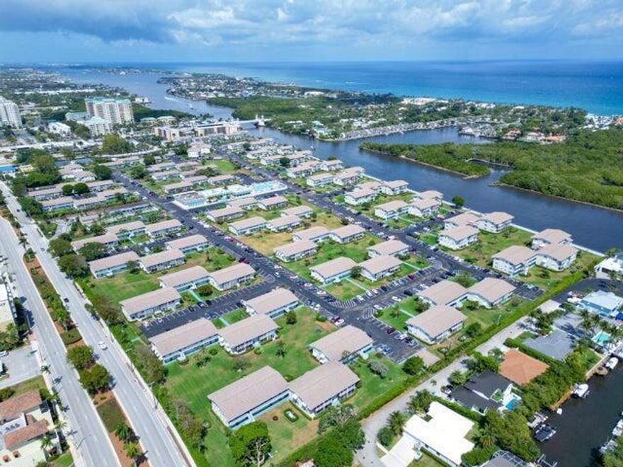 ENJOY THIS GREAT INTRACOASTAL GATED COMMUNITY, THIRD FLOOR UNIT IN ELEVATOR BLDG WITH WATER VIEW, SIT BACK AND WATCH THE BOATS GO BY, WALKING DISTANCE TO WATERFRONT DINING AND FOR SOME THE BEACH, UNIT IS TILED THRU OUT,  OPEN BRIGHT AND AIRY.  PICTURES DUE 12/5
