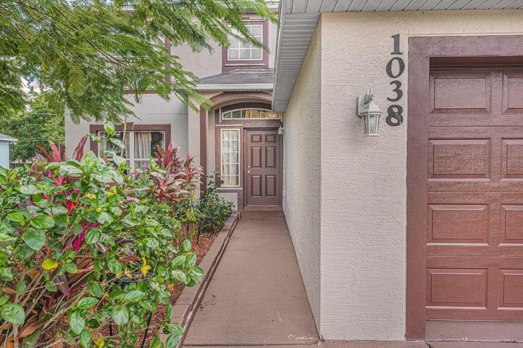 Photo of 1038 SW Liberty Ave, Port Saint Lucie, FL 34953 (MLS # R10935193)