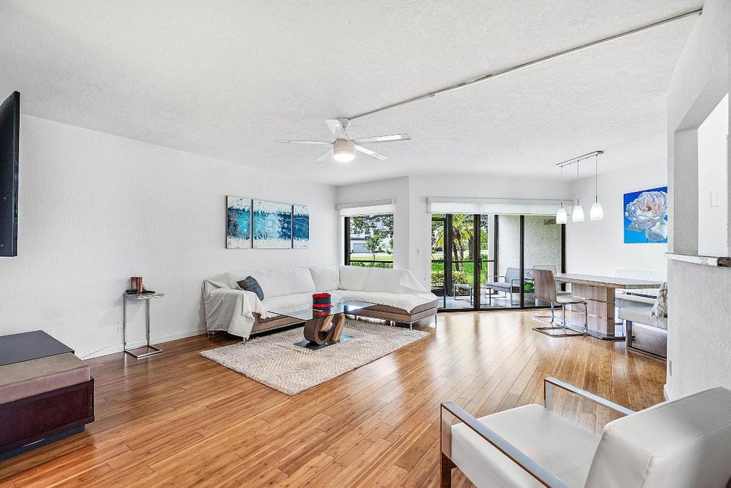 Photo of 5651 Camino Del Sol #102, Boca Raton, FL 33433 (MLS # R11122790)