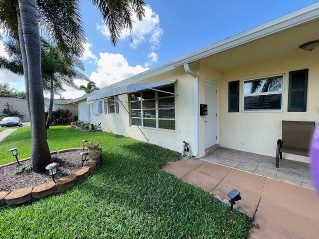 Photo of 3250 Park Lane Ln #C, Boynton Beach, FL 33435 (MLS # R10789557)