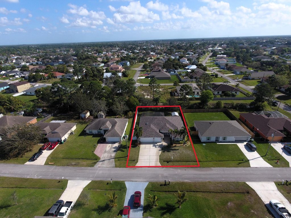 Photo of 3673 SW Parsons Street, Port Saint Lucie, FL 34953 (MLS # R10956512)