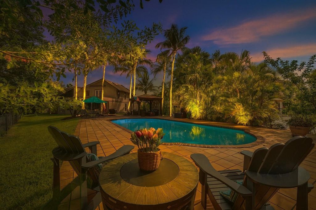 Photo of 750 Bluebird Lane, Plantation, FL 33324 (MLS # F10516079)