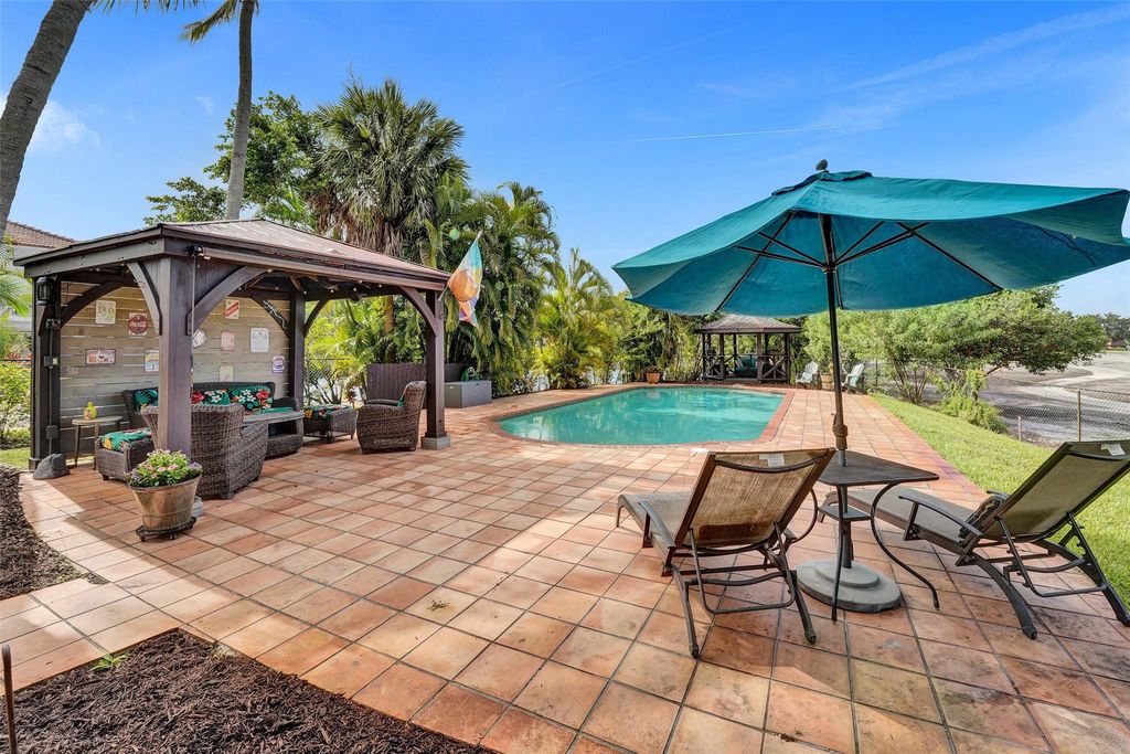 Photo of 750 Bluebird Lane, Plantation, FL 33324 (MLS # F10516079)