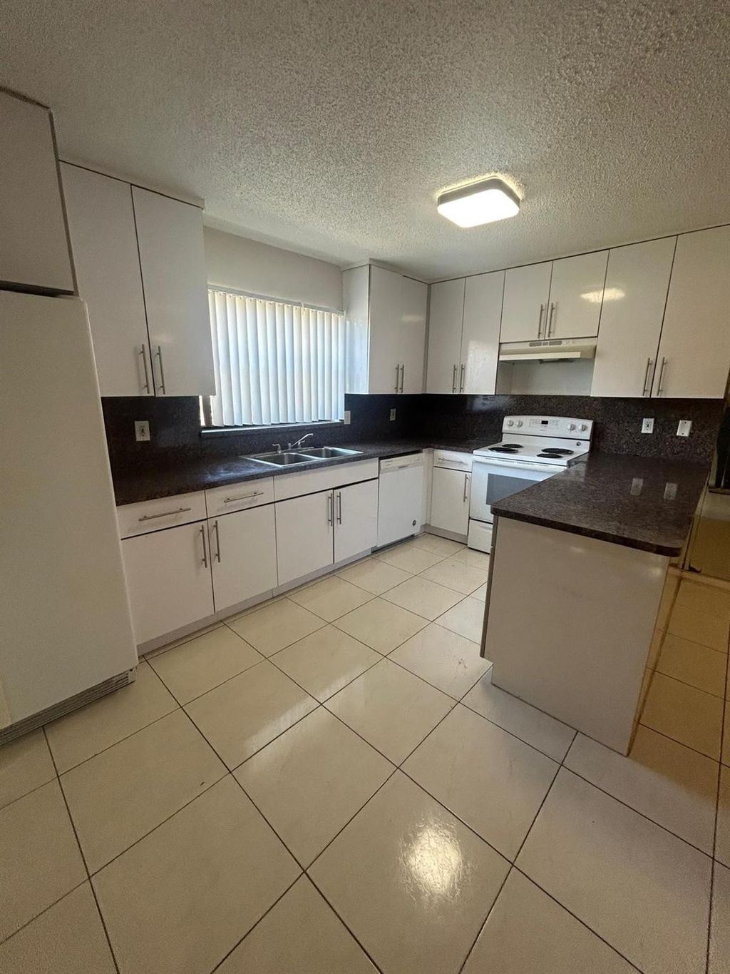 Photo of 5821 Swordfish Court #B, Tamarac, FL 33319 (MLS # F10554245)