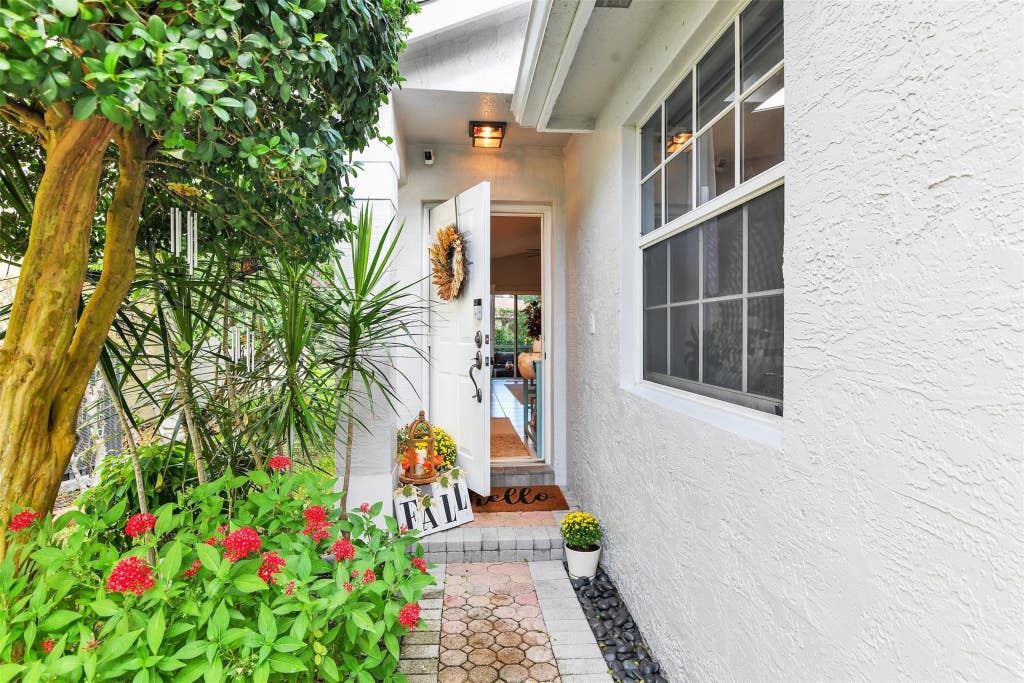 Photo of 5285 NW 117TH Avenue, Coral Springs, FL 33076 (MLS # B26057198)
