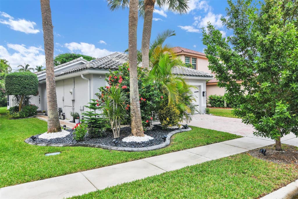Photo of 5285 NW 117TH Avenue, Coral Springs, FL 33076 (MLS # B26057198)